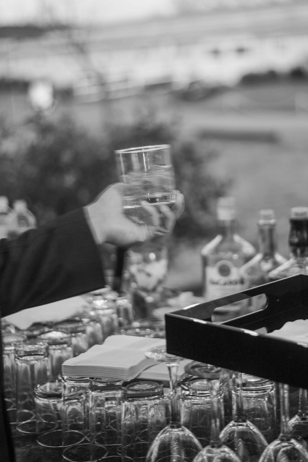 Guest grabbing a beverage from the bar.