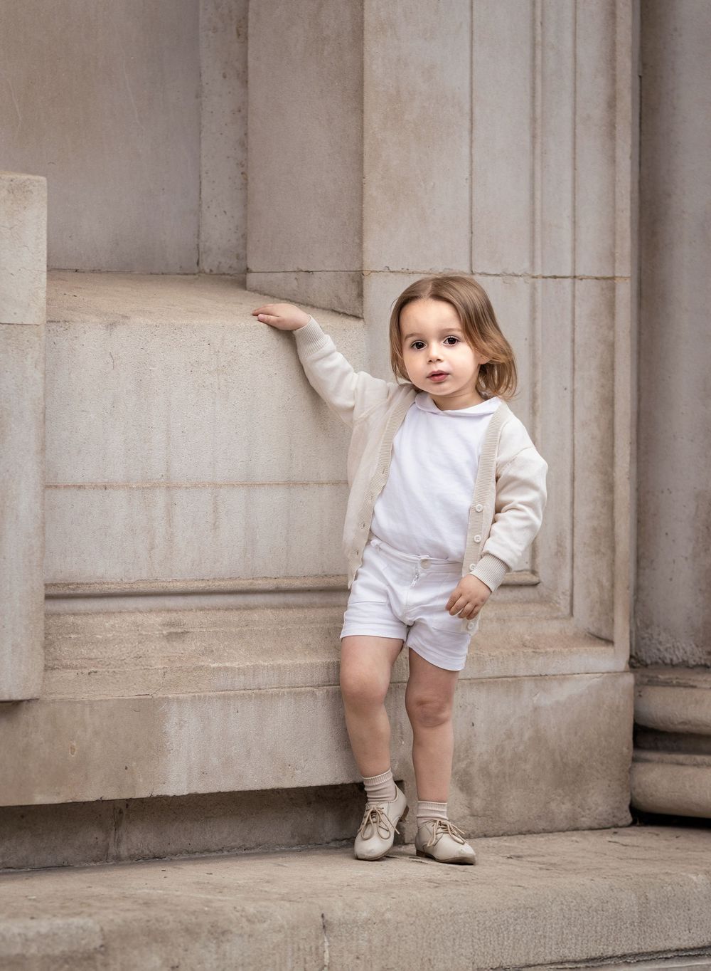 Portrait of a boy on street of London.