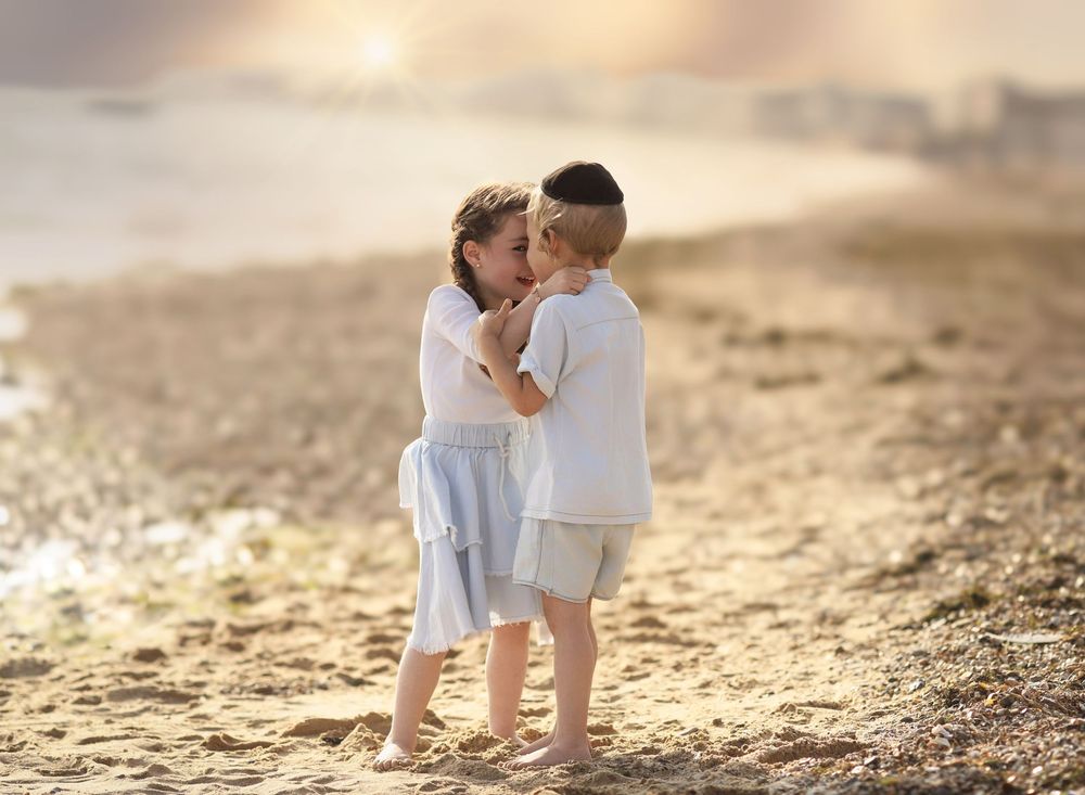 Siblings portrait at the beach.