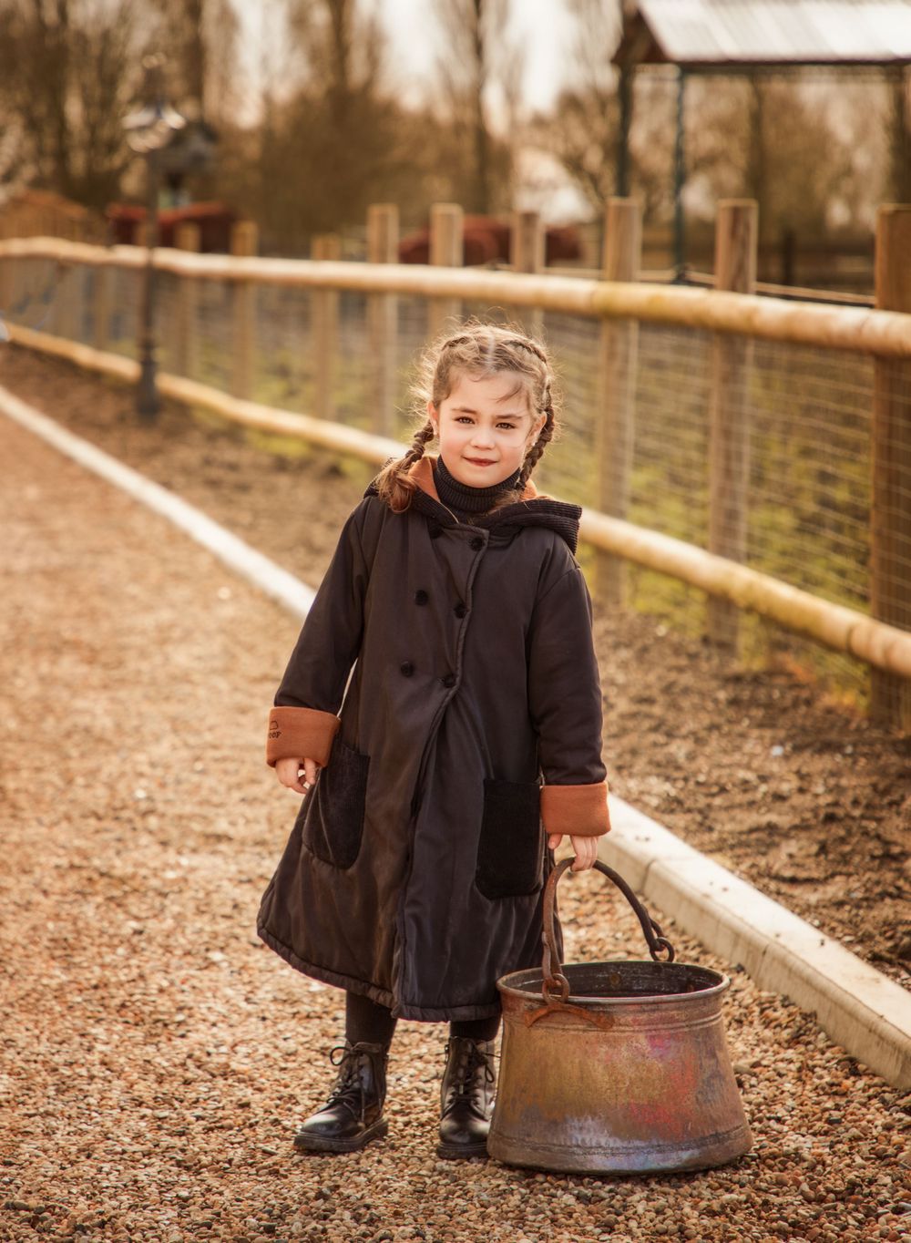 A child portrait on an old fashioned farm.