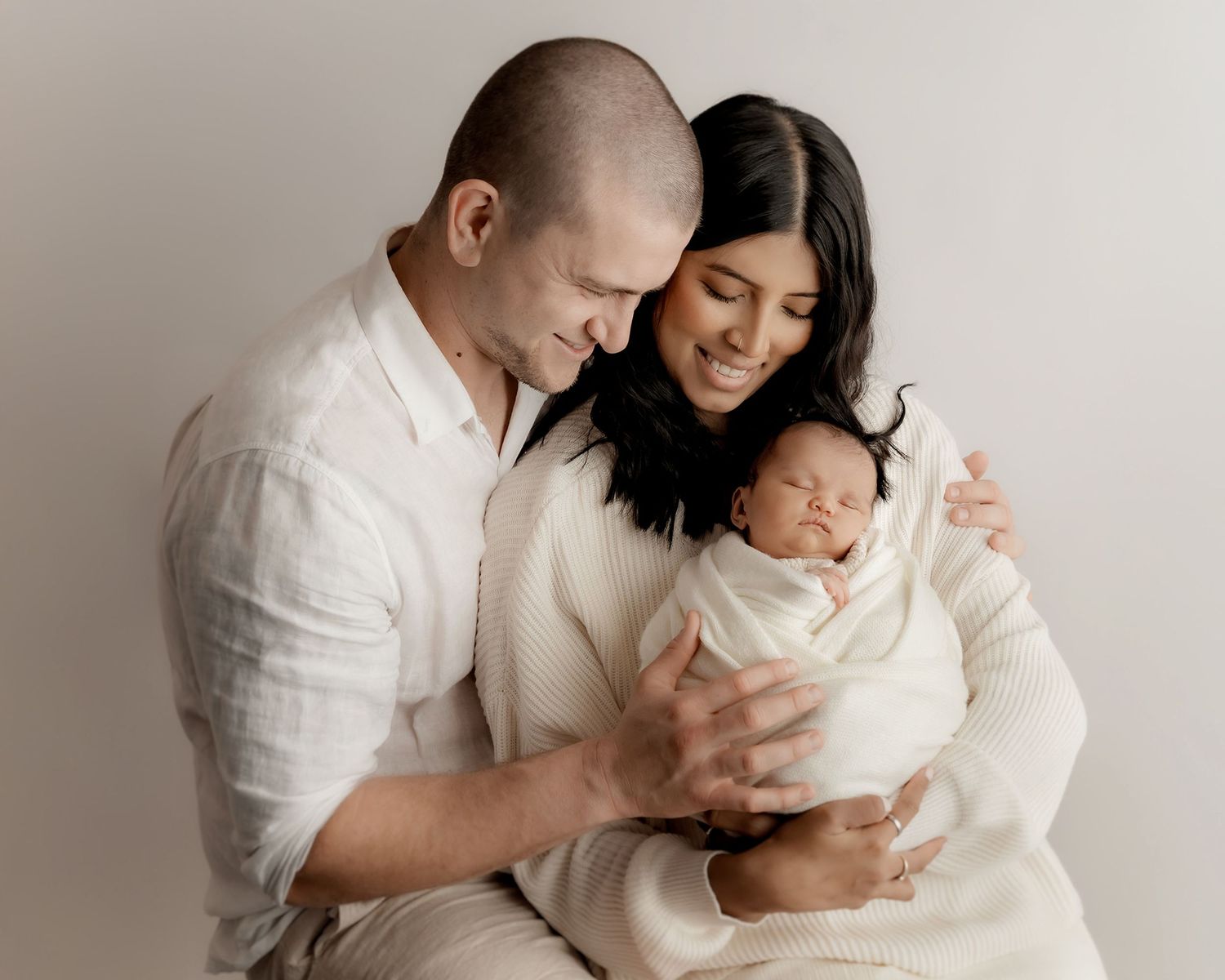 Family connection during newborn photography session