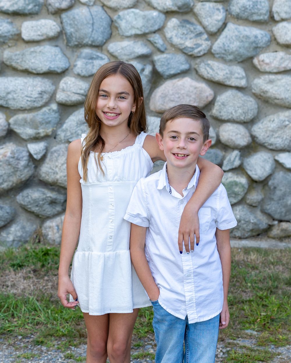 Family photo of siblings at Wolbach Farm in Sudbury, MA during the summer for family photography session.  Weston, Concord, Wayland.