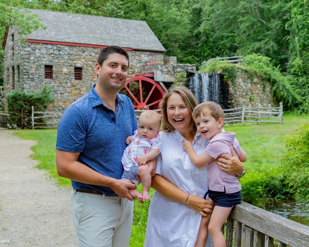 Family photo at Wayside Grist Mill Sudbury, MA during  summer for family photography session.  Weston, Concord, Wayland, Framingham, Stow.