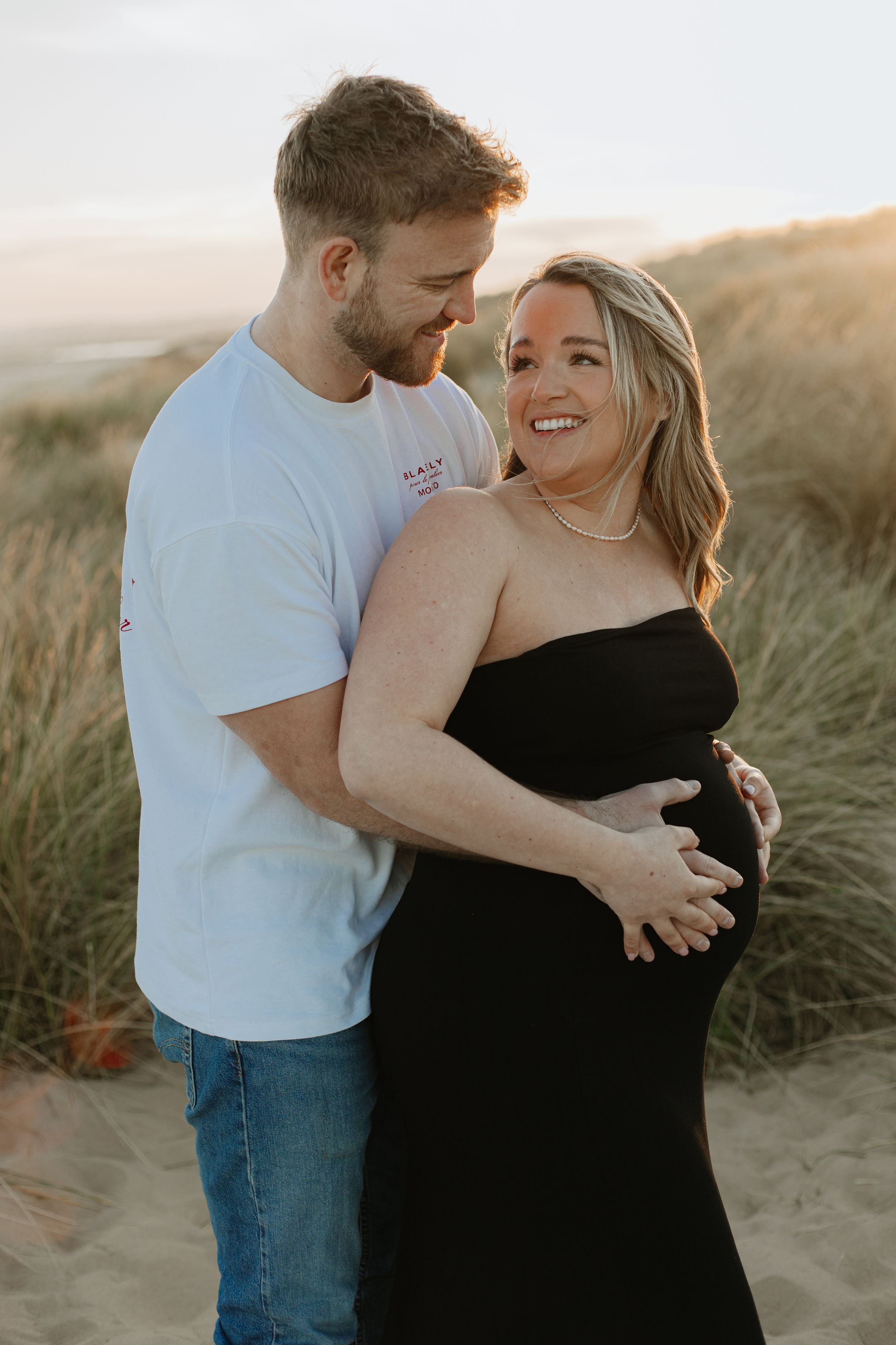maternity photoshoot at sunset in Kent beach camber sands