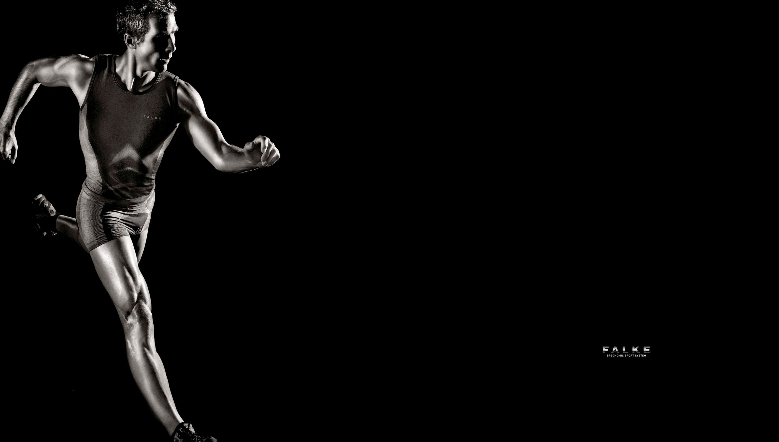A dynamic black and white photo of a male athlete sprinting against a dark background with the Falke brand logo.