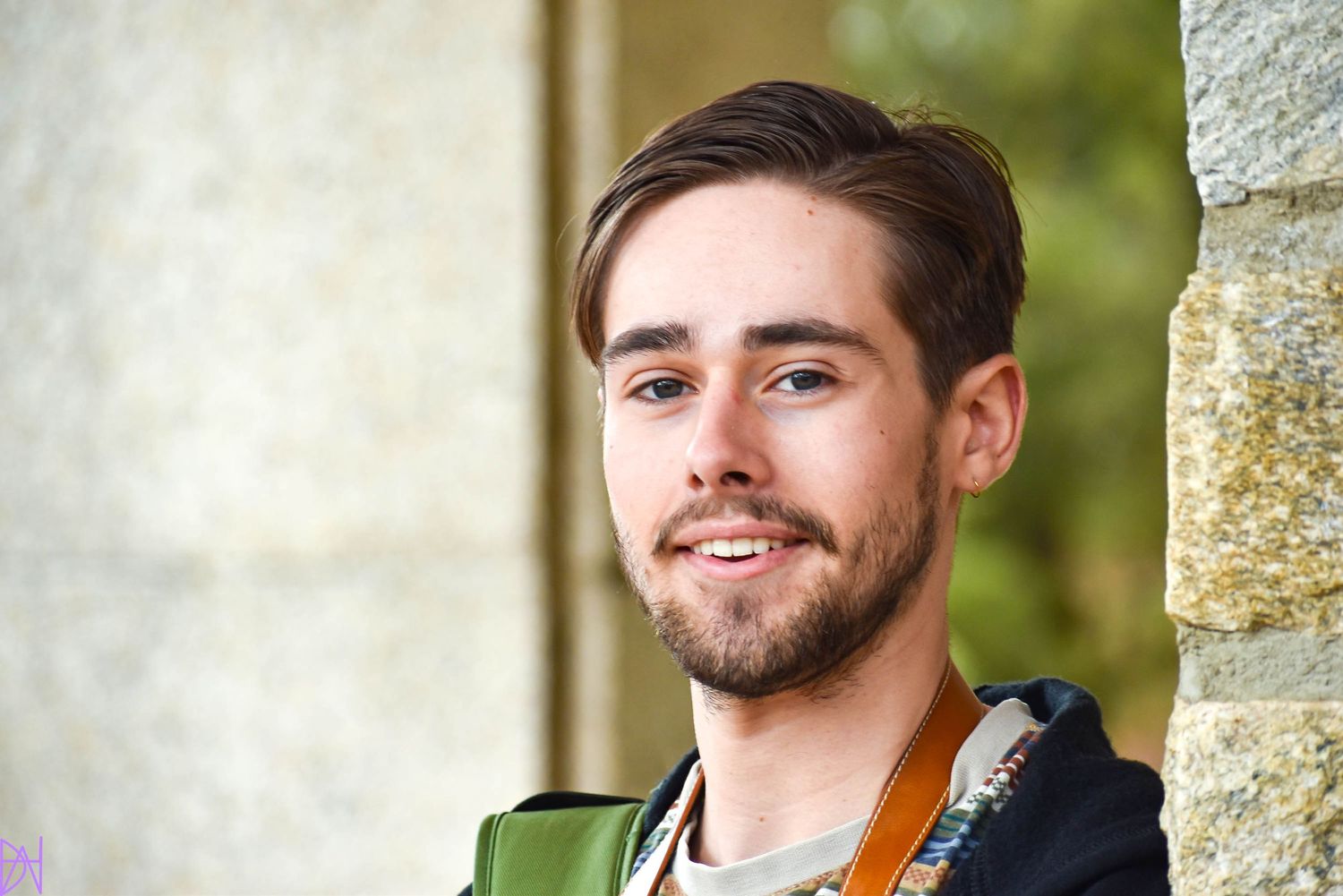 Close-up photo of a man smiling during a personal branding session
