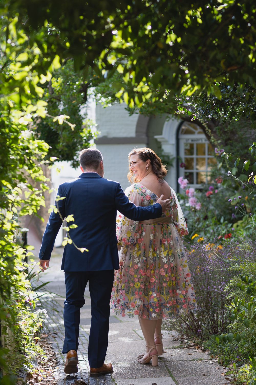 Wedding couple in church garden, Rye