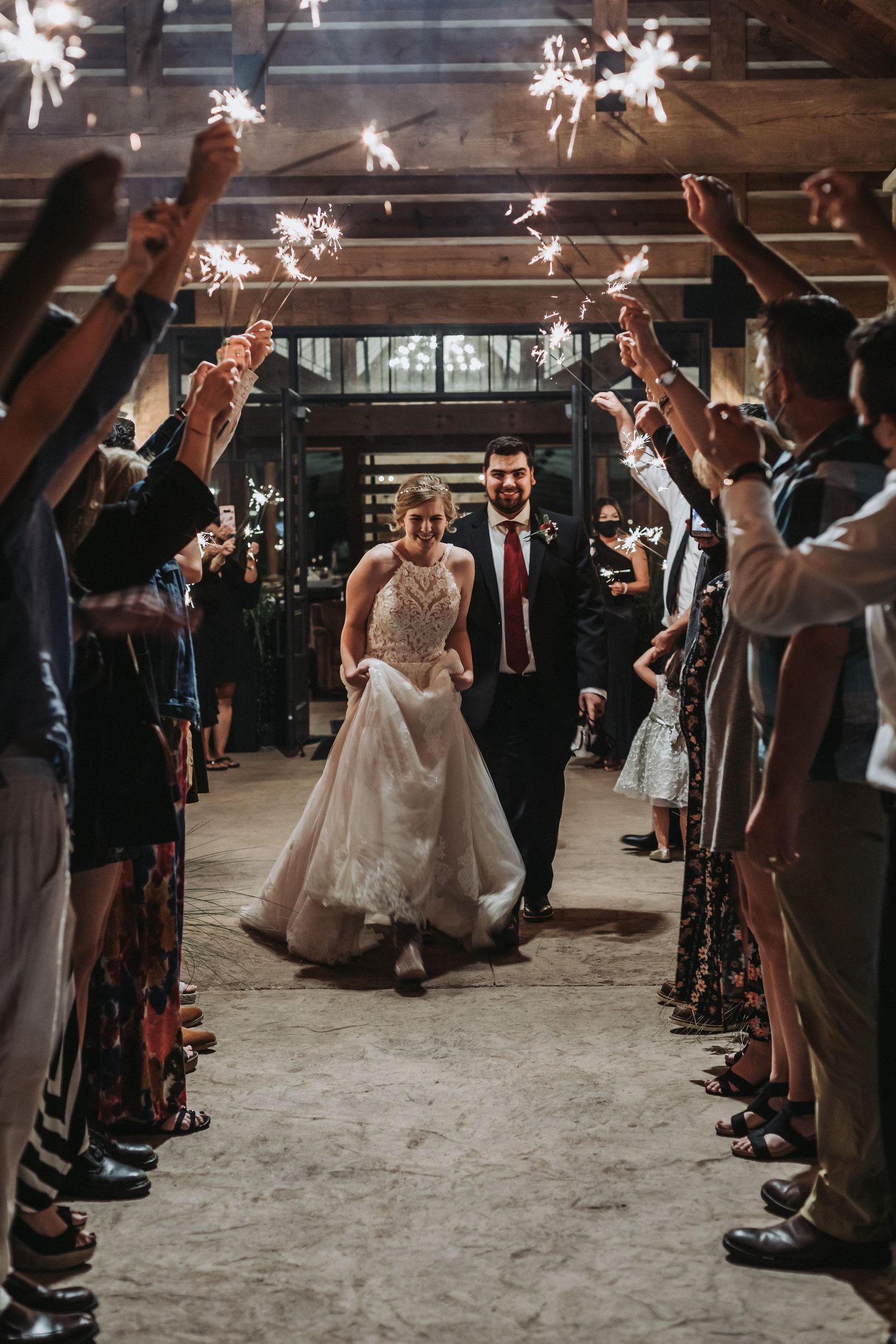 Married couple walking out during the send off.