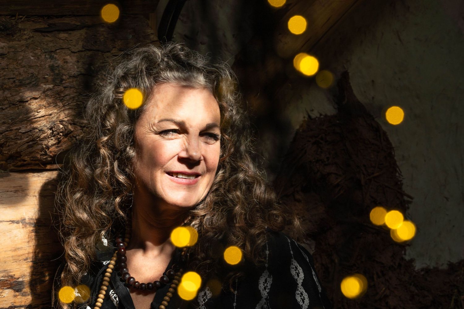 personal bring photo Bristol a portrait of a sound healer with bokeh lights in the foreground