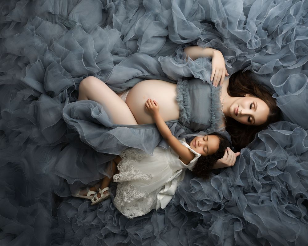 Maternity photographer with gowns