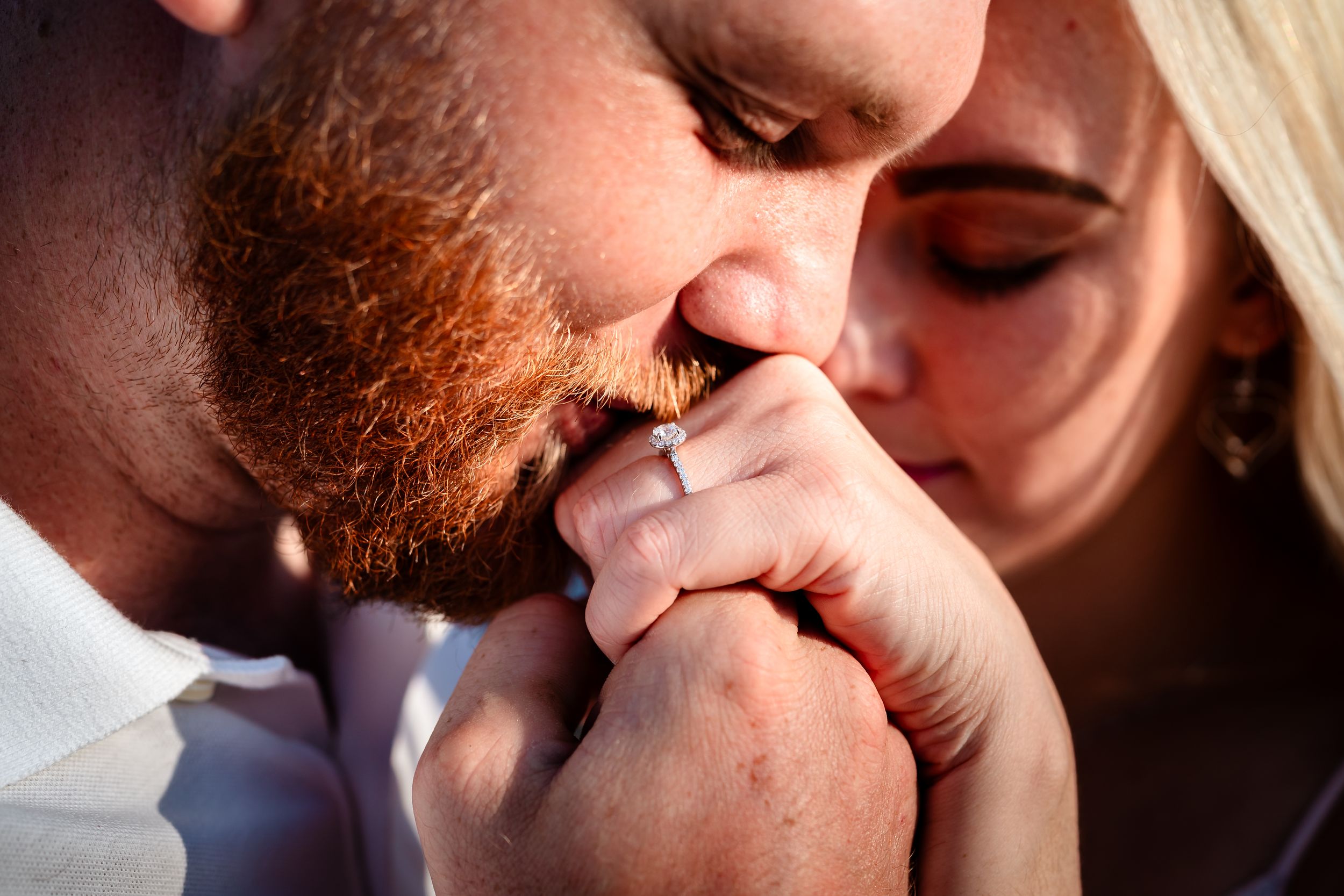 Intimate close-up moments between couple in natural lighting.