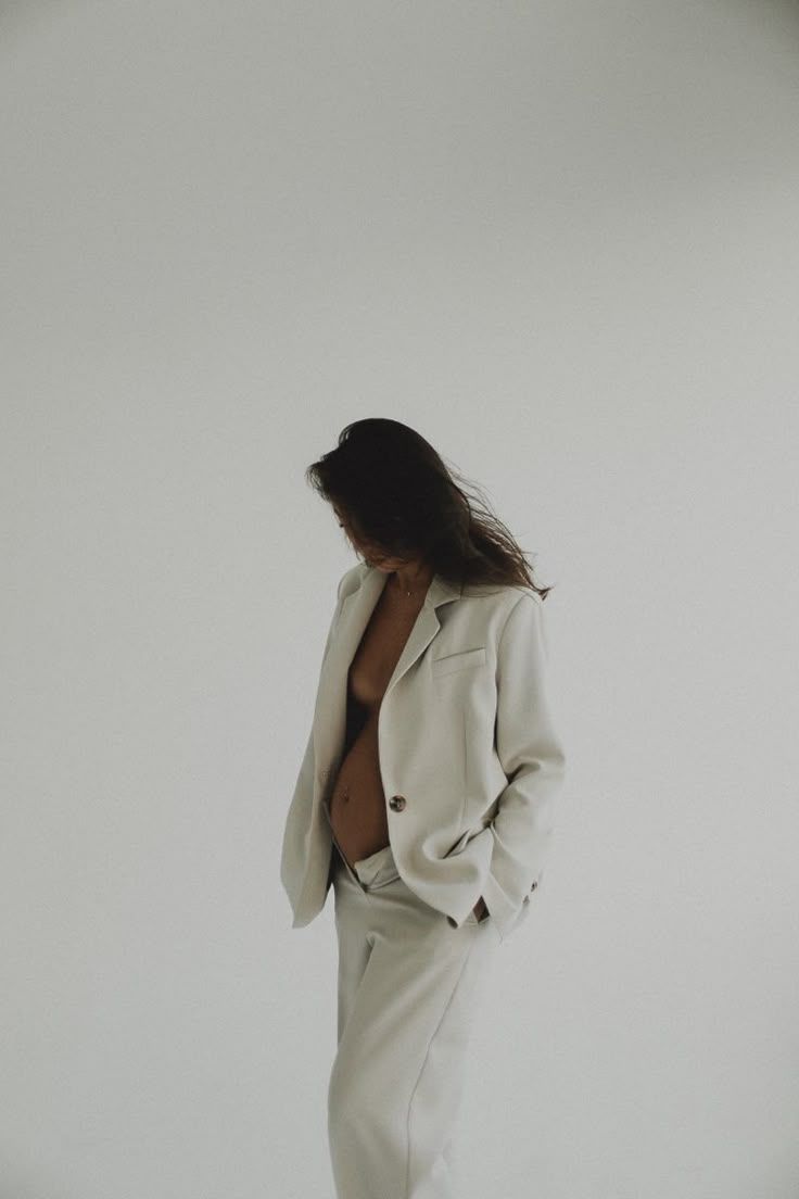 Elegant cream-colored blazer and pencil skirt ensemble styled into a dynamic fashion photo sequence against a light background.