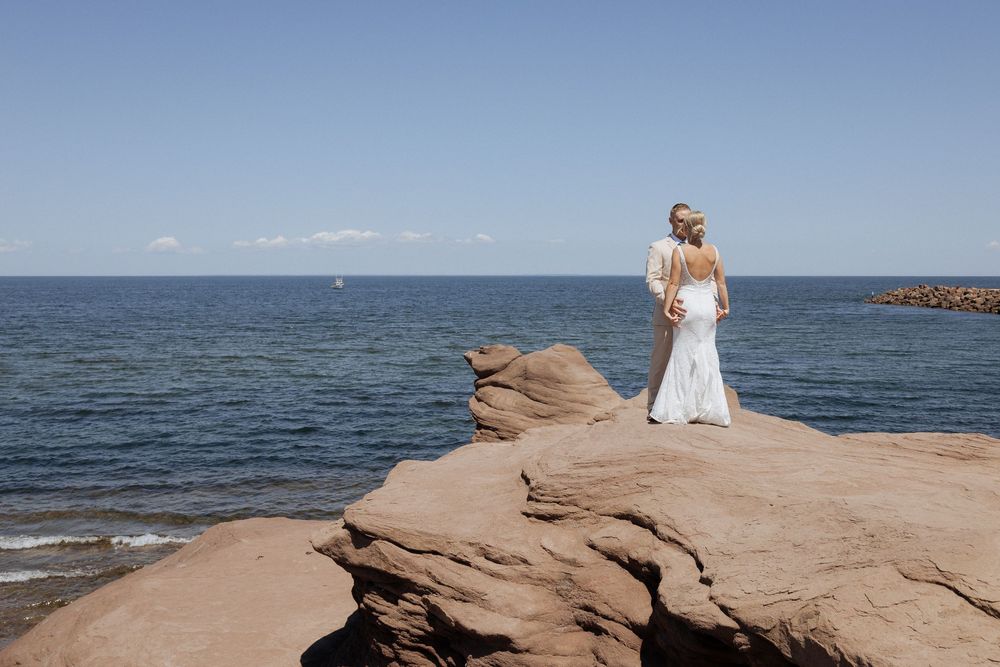Bride and groom portraits by fine art wedding photographer NB. Bride and groom first look captured in Moncton NB.