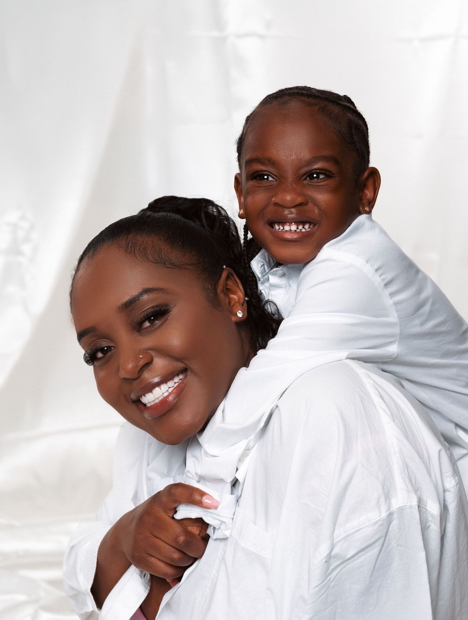 A series of five professional studio photos showing warm smiles against a white backdrop.