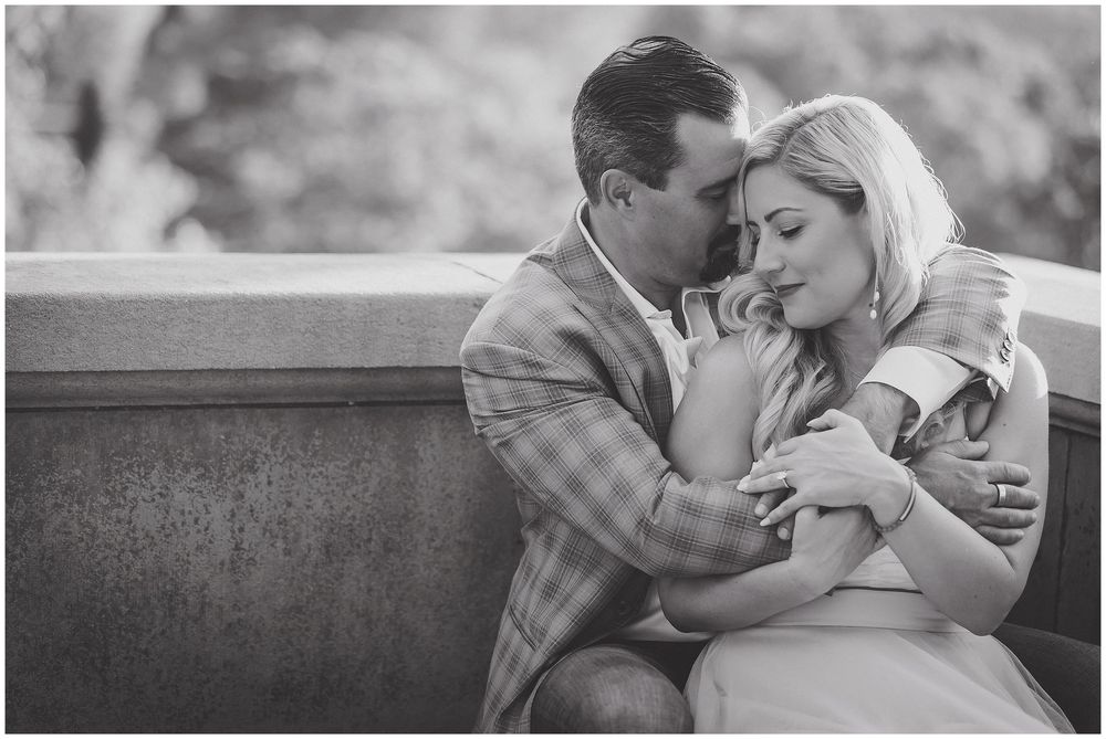 A romantic black and white photo series showing intimate moments between a couple sharing tender kisses and embraces.