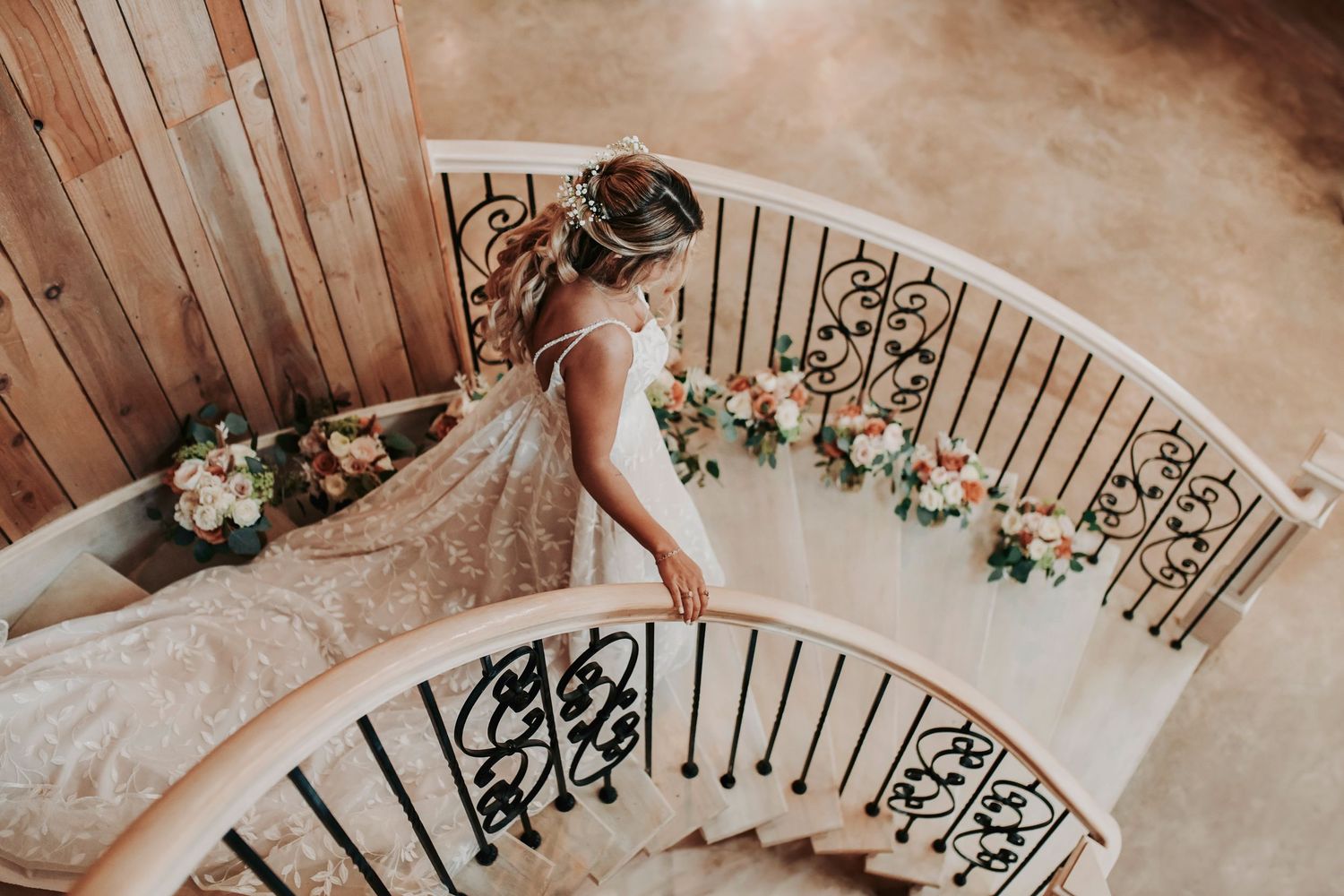 Emotional father of the bride first look on rustic staircase at Whispering Oaks Wedding Venue