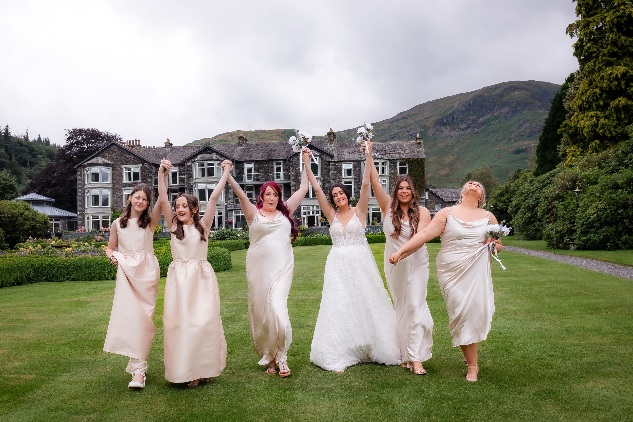 wedding photography in Cumbria - bridesmaid having fun