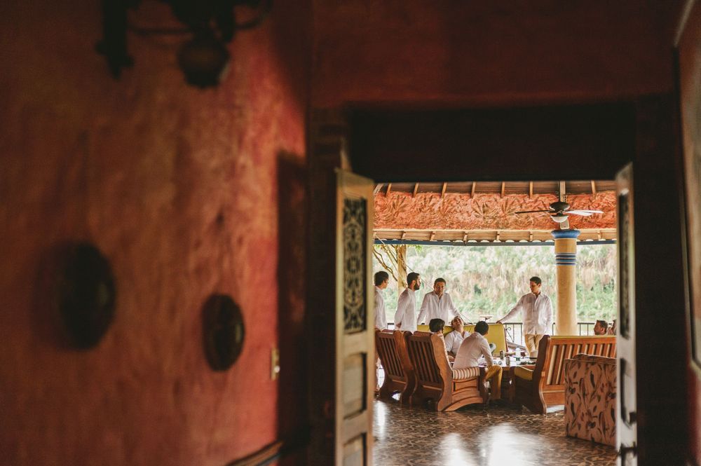 Groom and best men relaxing moments before the wedding ceremony.
