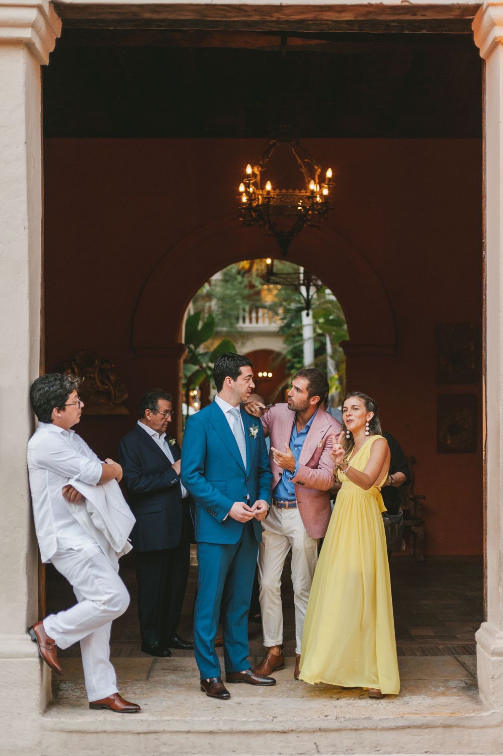 Groom talking to wedding guests in Cartagena.