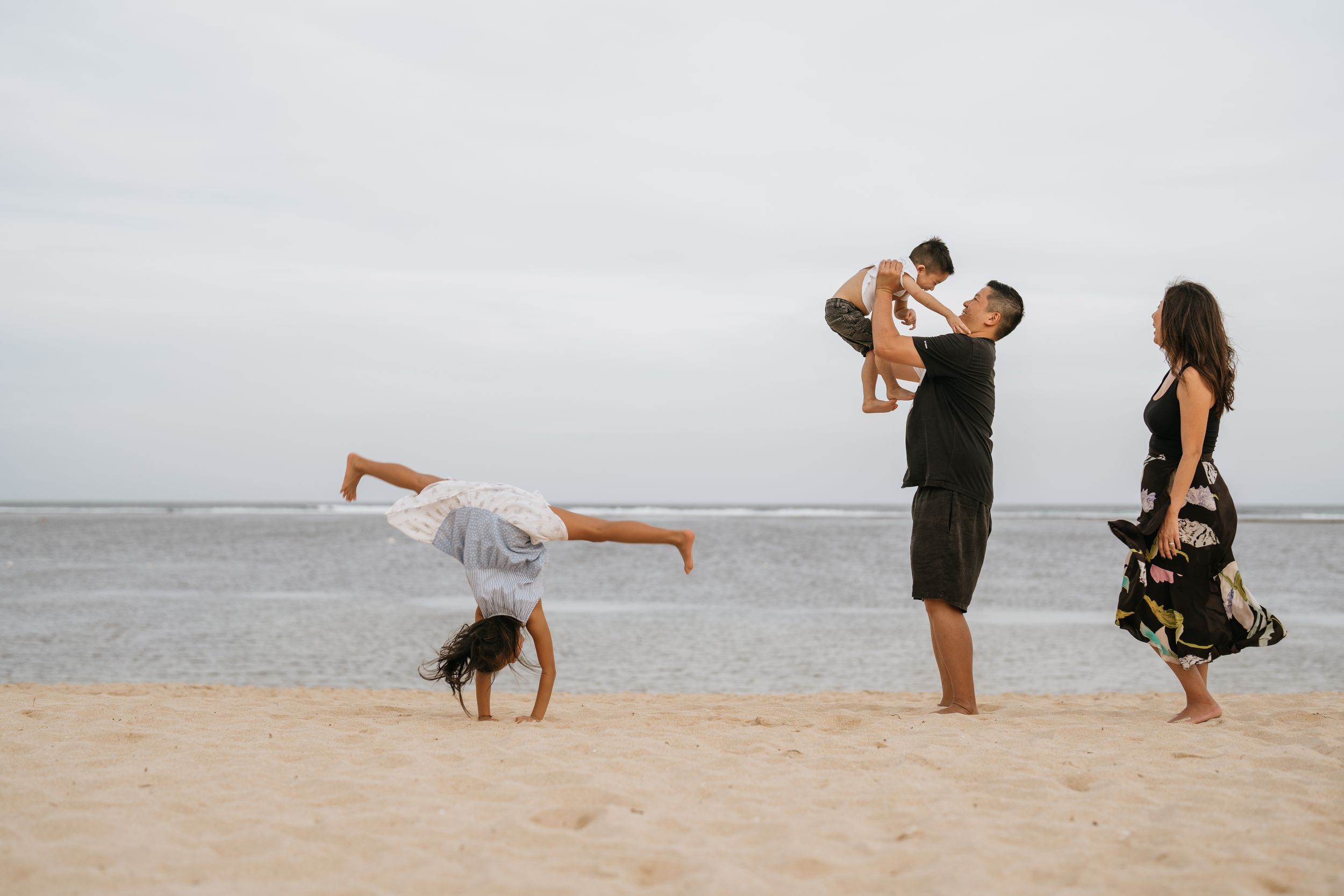 Bali family photography services with beach background