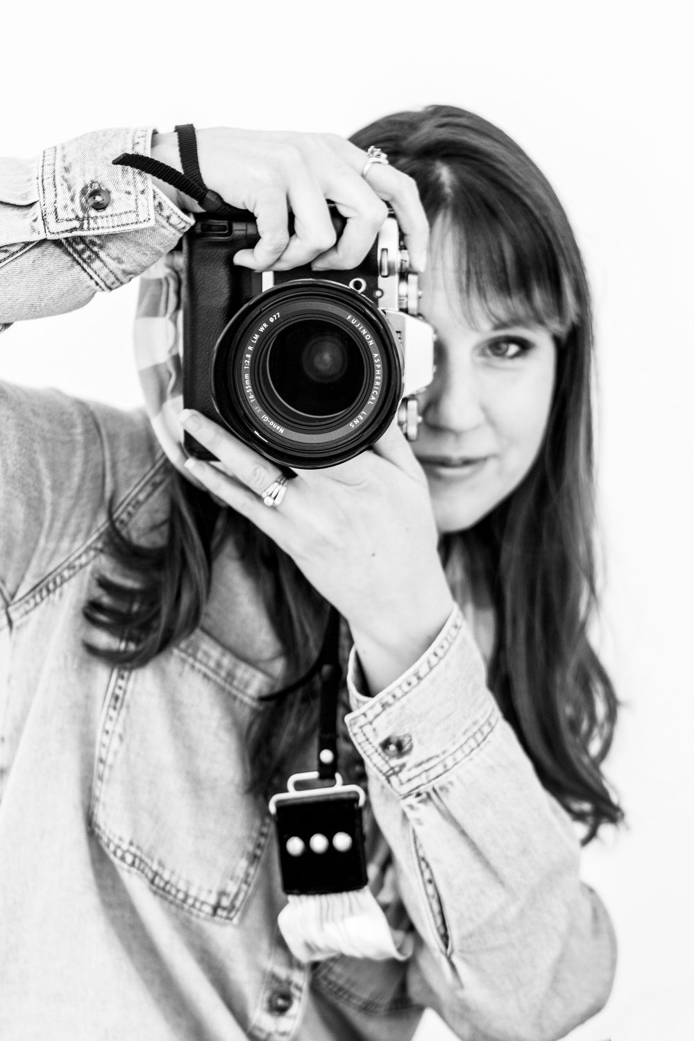 Studio photographer, black and white studio photography. Black and white photograph of a photographer