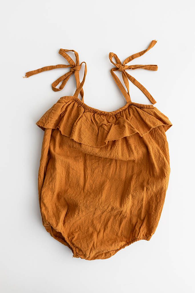 Ruffled bubble romper from Temecula baby photographer's client closet.