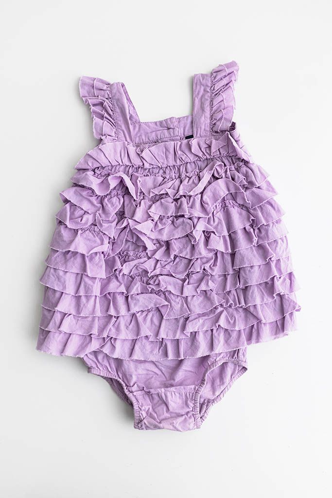 Lavender purple tiered ruffle sleeveless bubble romper for 6 month old baby photography session in Perris CA.