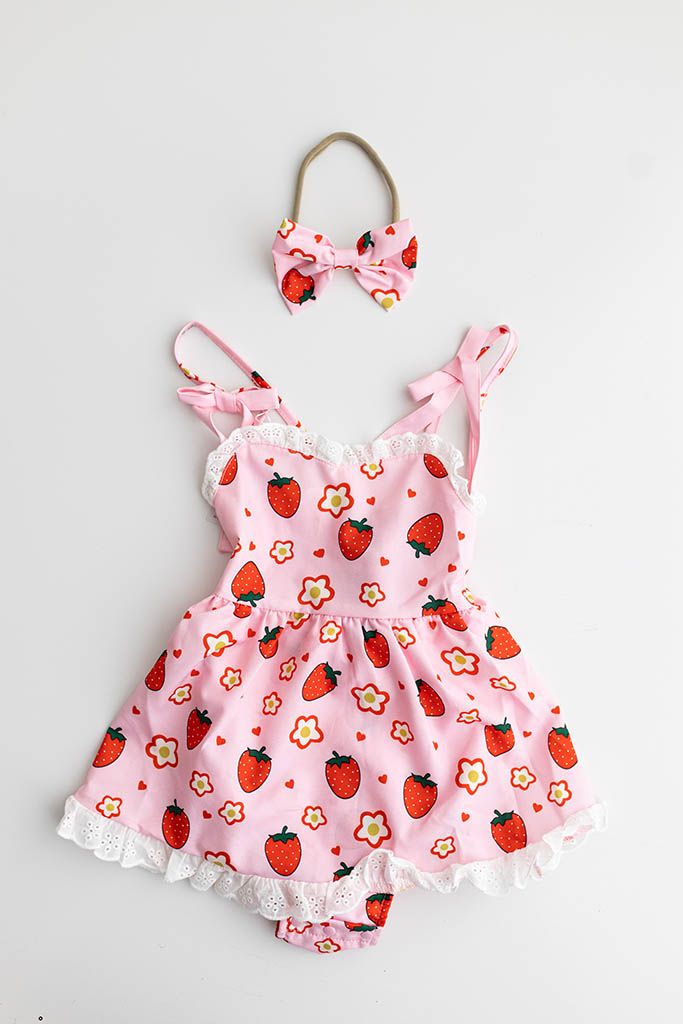 Sweet one first birthday photography session outfit, a pink baby romper dress with strawberry and floral print