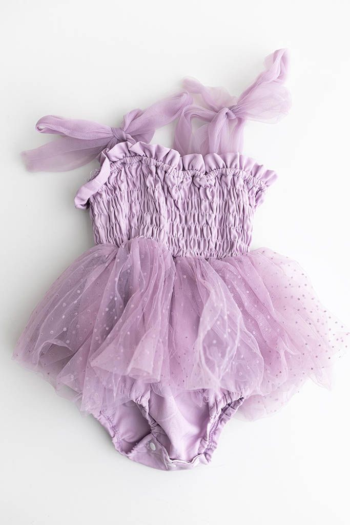Lavender purple baby tutu romper for 6 month old baby girl photos.