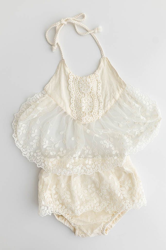 Cream embroidered lace halter baby romper set with matching bloomers and floral detail.