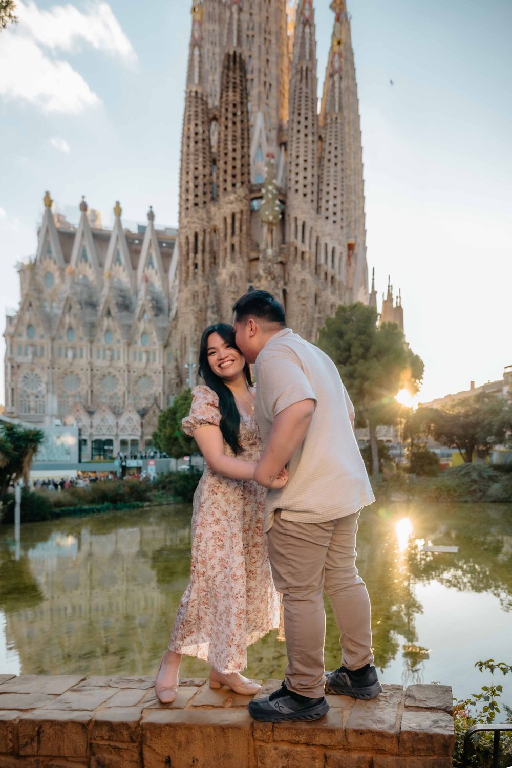 Romantic embrace between couple on their first trip to Europe.