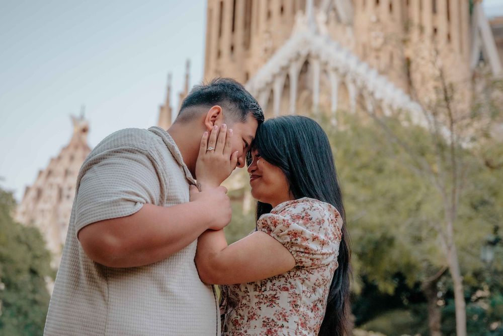 Joyful couple laughing together just moments after getting engaged.