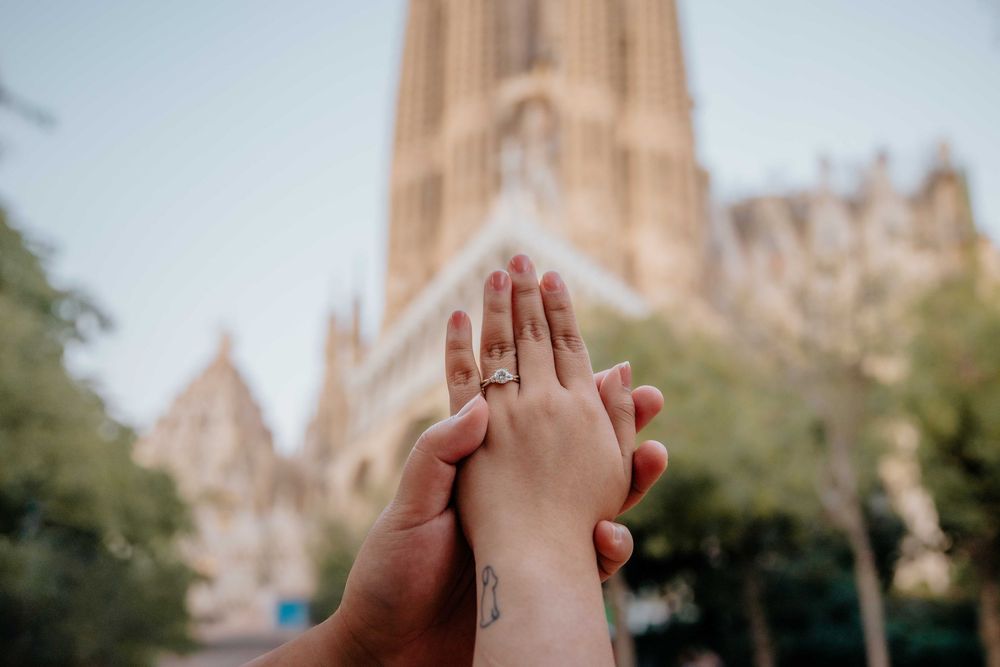 Chrizelle and Allen showing off the engagement ring in front of Sagrada Família.