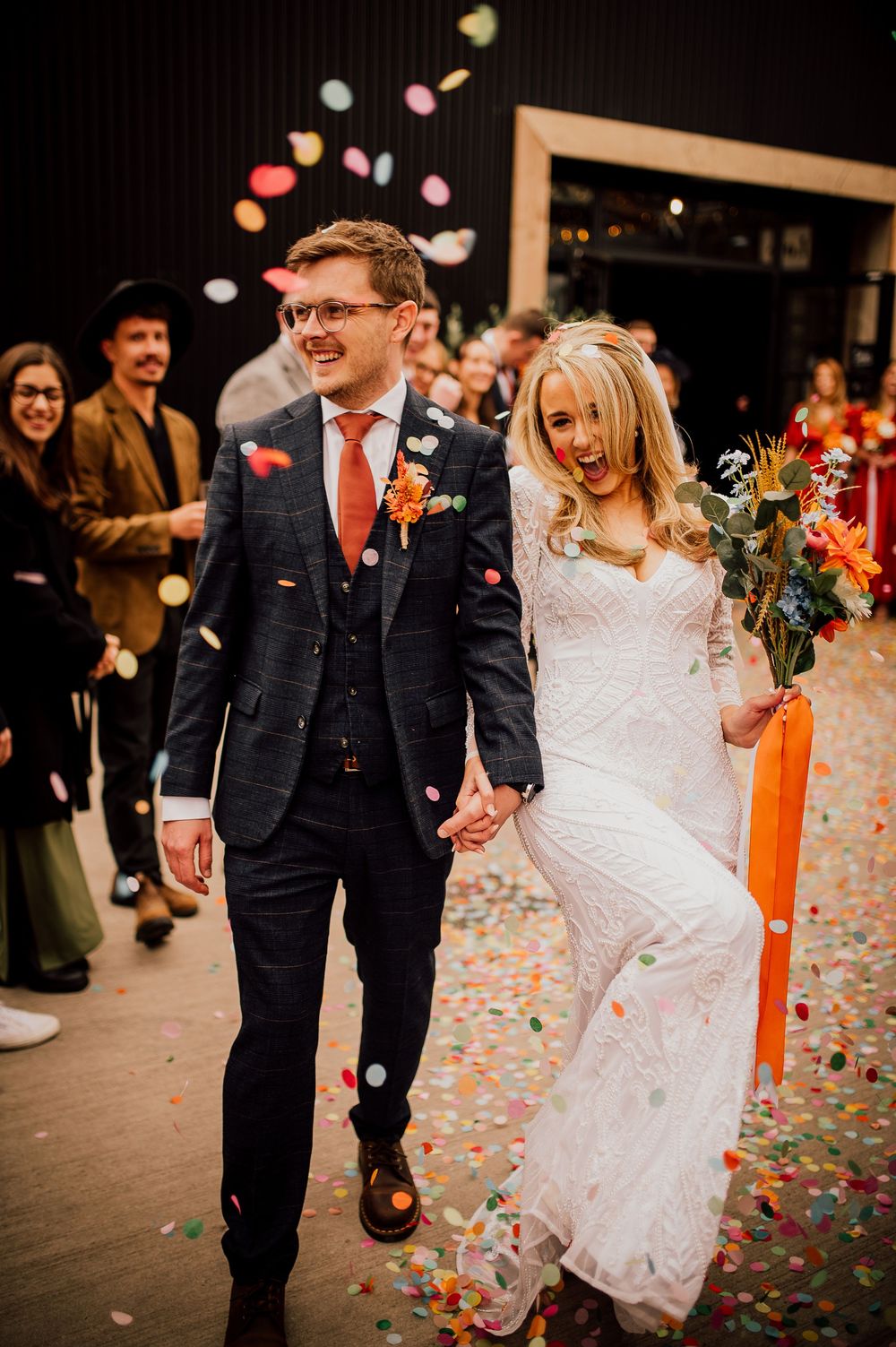 A couple celebrates their wedding day with joyful dancing amidst colorful confetti in a sequence of candid reception photos.
