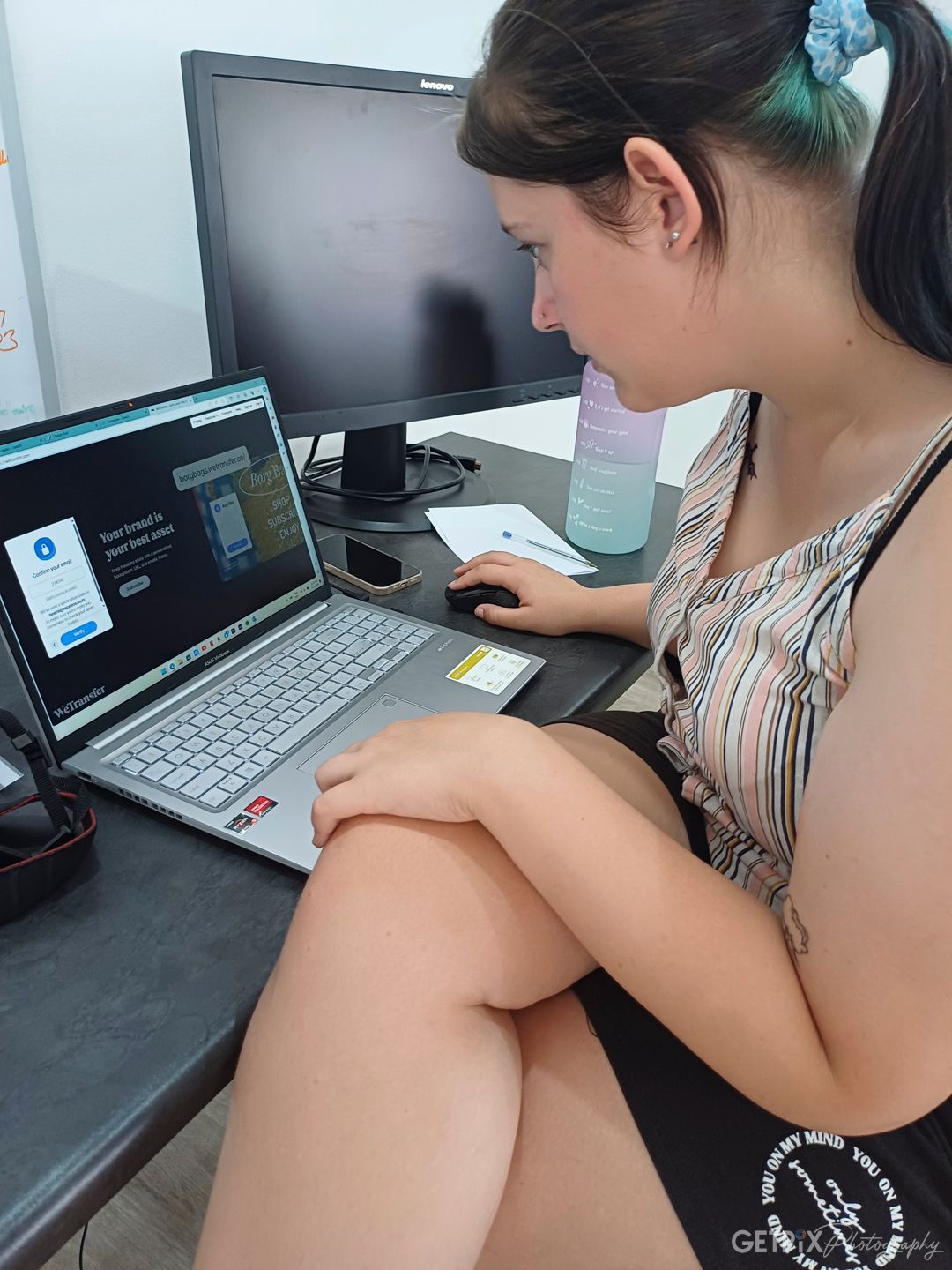 Photographic student learning Adobe Lightroom