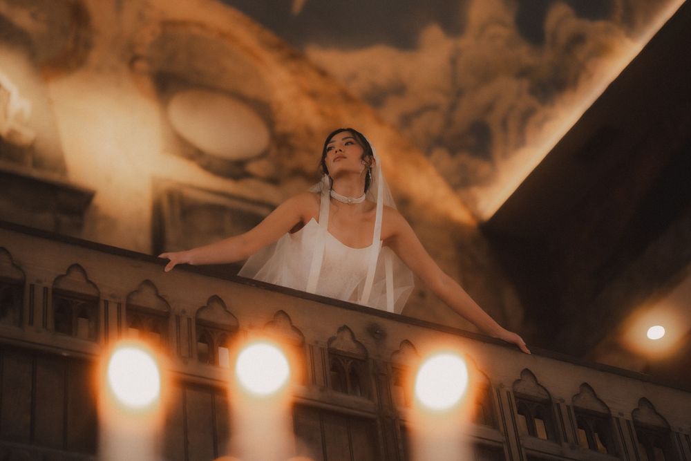 A series of warm-toned photos showing a person performing contemporary dance movements in dramatic lighting.