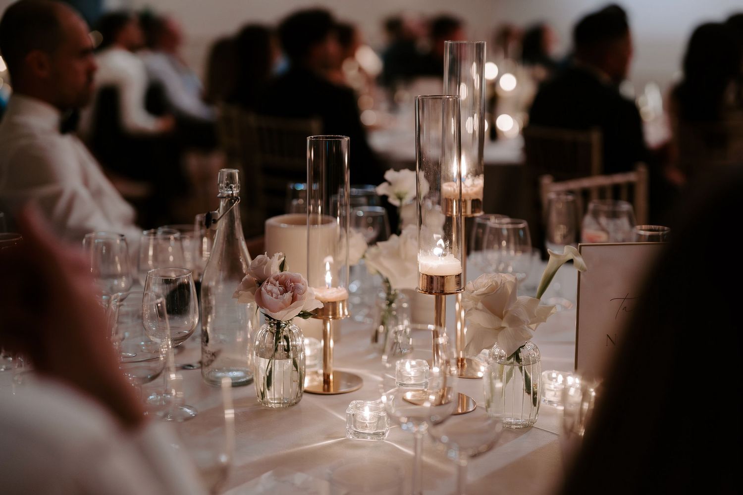 candles and flower arrangements during speeches at Iscoyd park