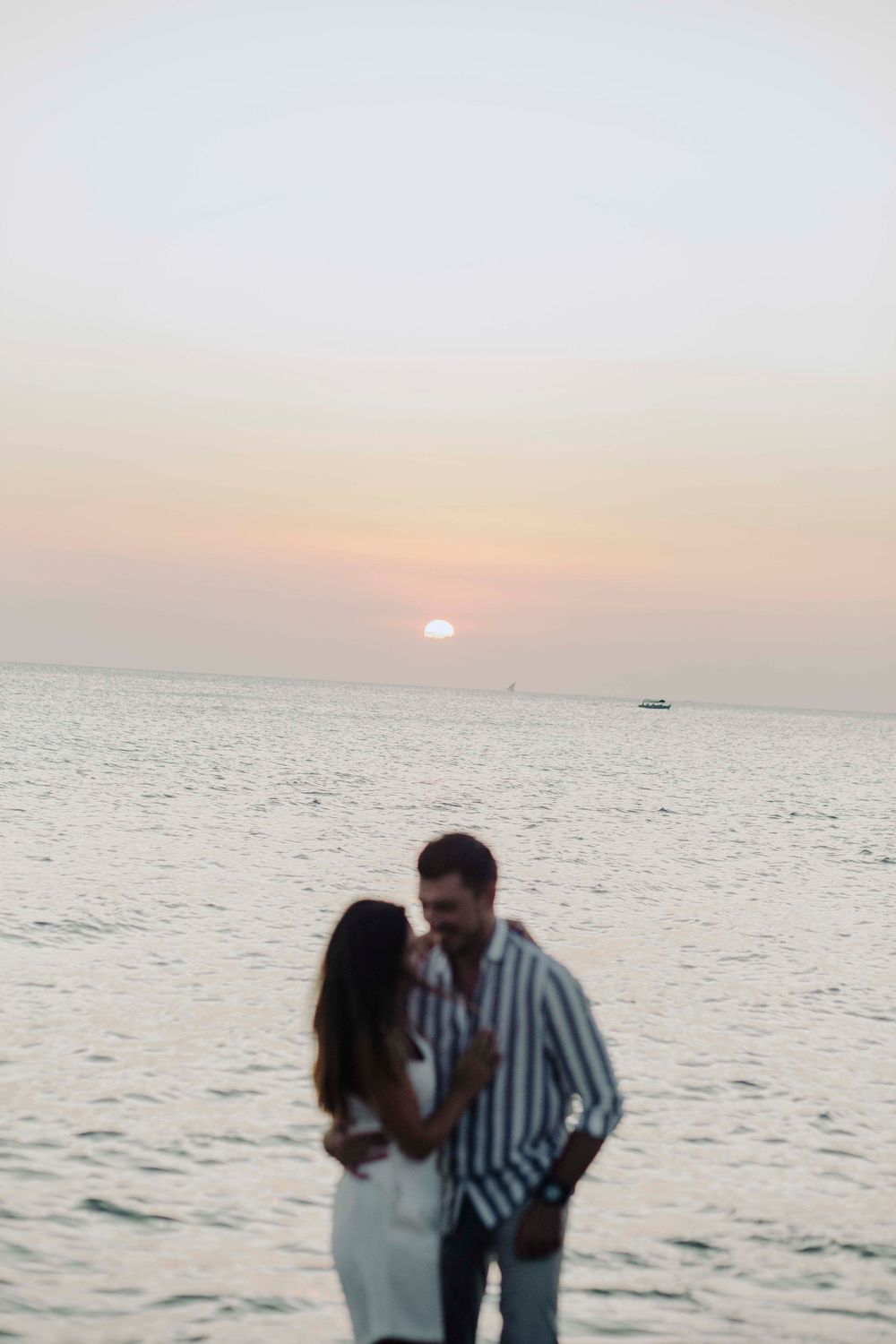 Romantic couple photoshoot in Zanzibar with natural light and ocean backdrop