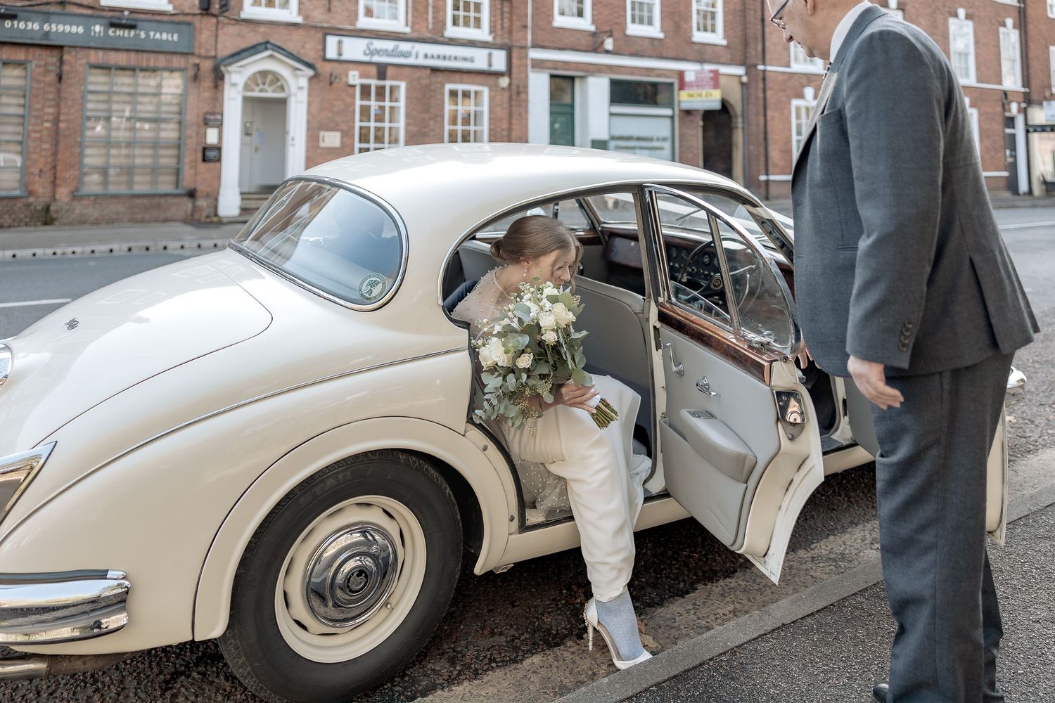 Documentary wedding photography at Gilstrap Registry Office in Newark.
