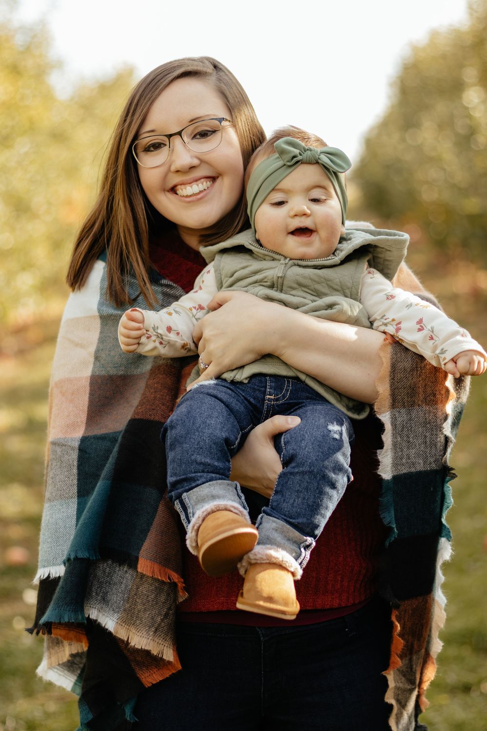 Candid family photography sequence showing loving interactions against autumn foliage.