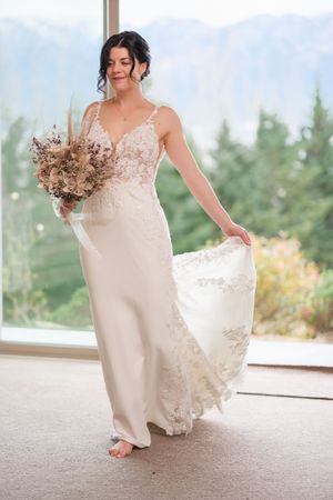 A series of wedding dress twirling photos showing delicate lace details and flowing movement against a bright window backdrop.