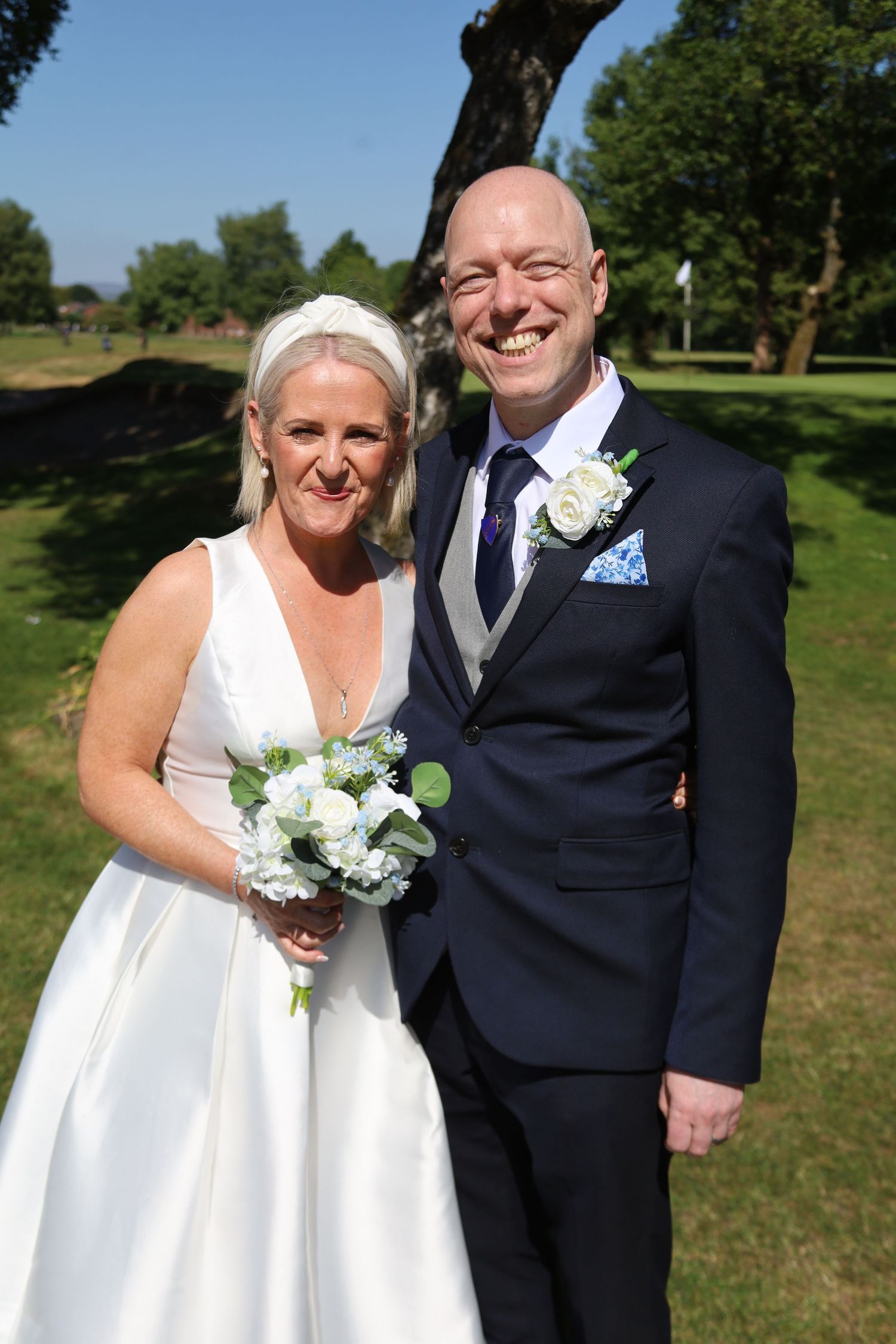 Relaxed wedding photography in Ashton, Manchester capturing natural moments between bride and groom