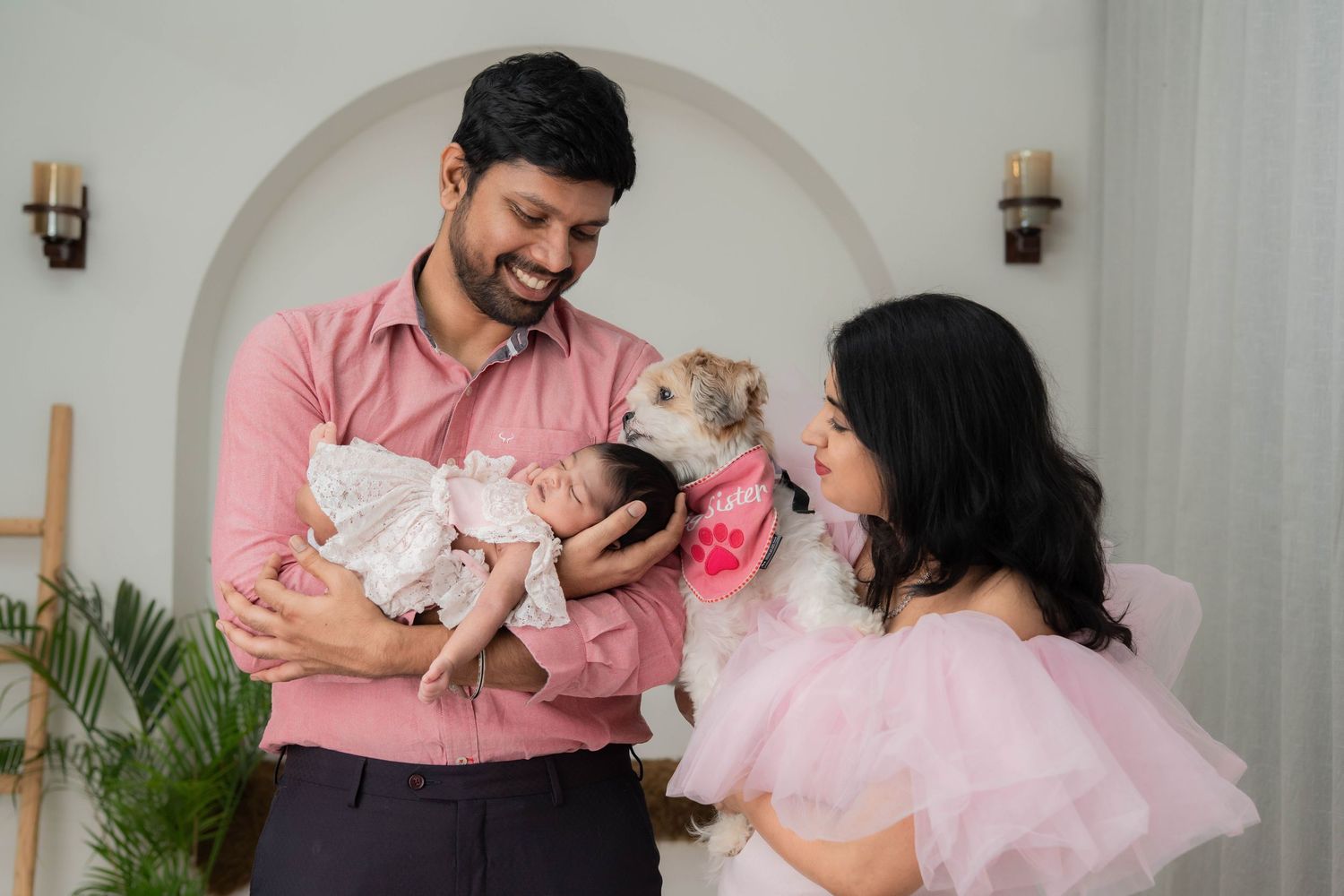 Family newborn photoshoot in Hyderabad studio with parents and baby in Manikonda