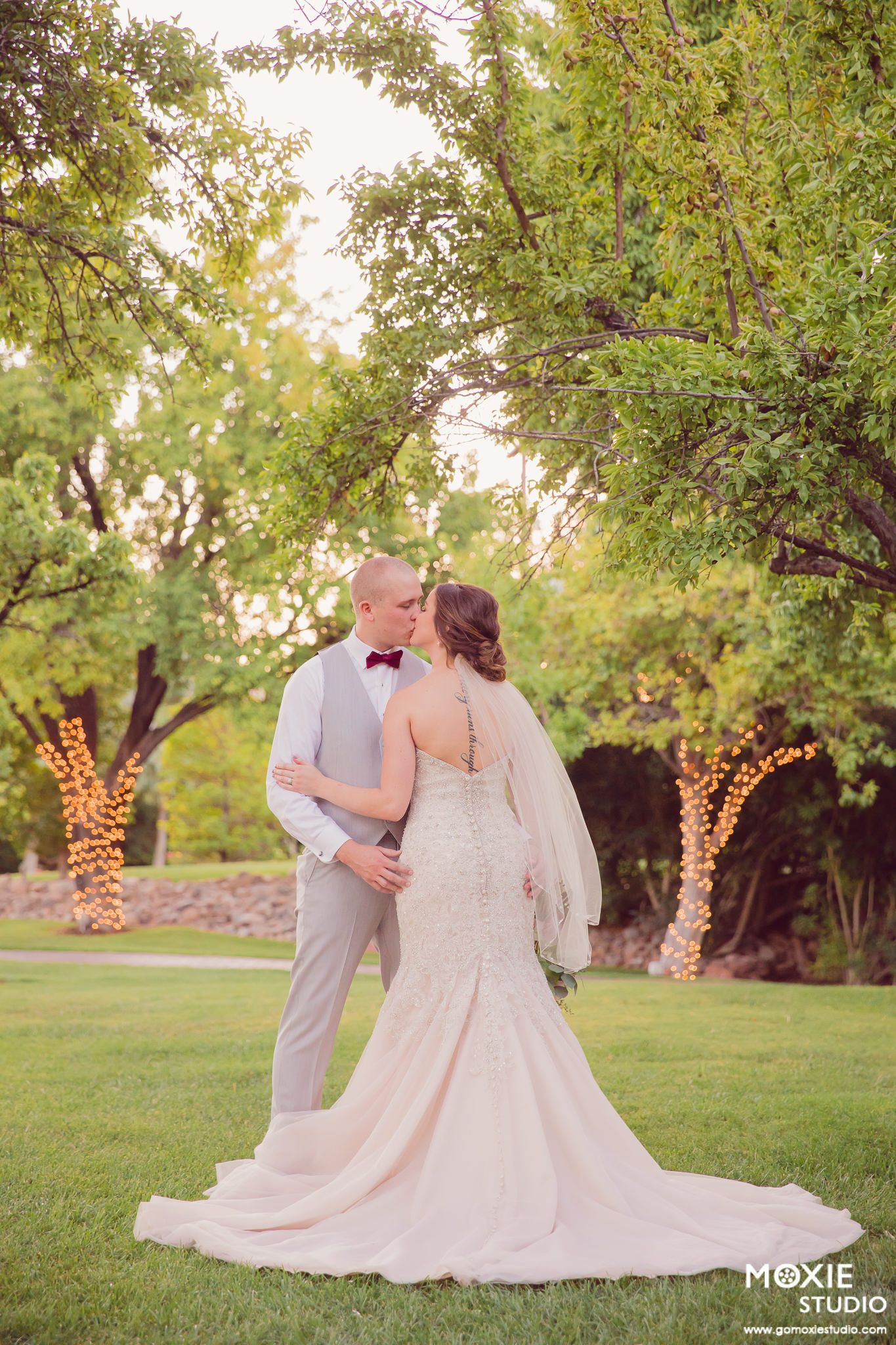 bride and groom portraits at DragonRidge Country Club sunset