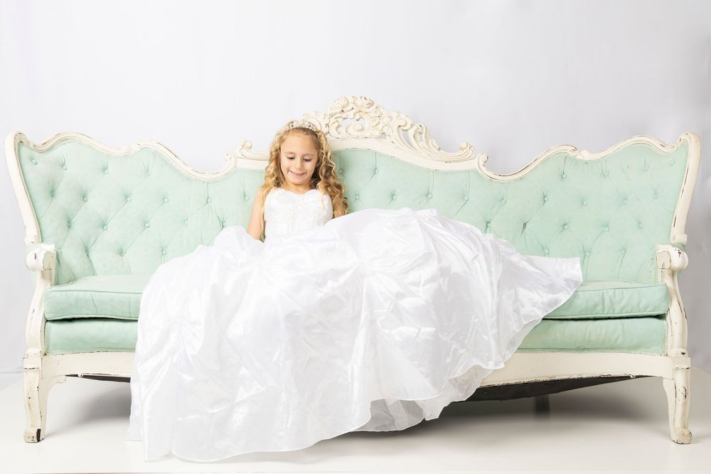Elegant mint green vintage sofa with ornate white frame displayed in a series of four matching views.