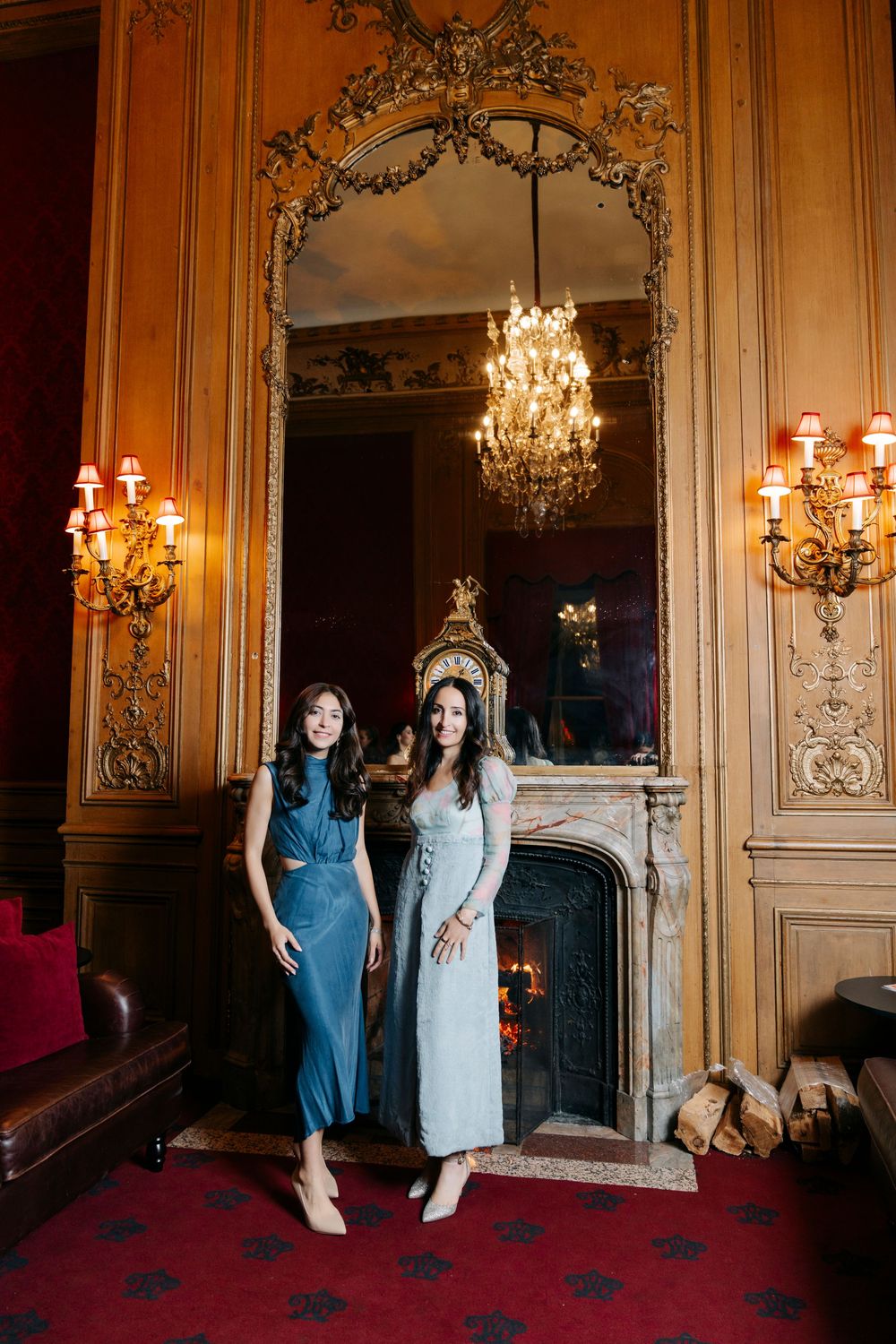 Five vintage-style photos showing an elegant room with ornate walls, chandeliers, and a fireplace in warm lighting.