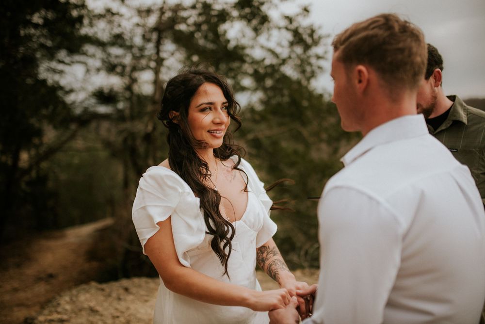 An elopement bride stares at her fiancé before they exchange vows and become husband and wife in Nashville, Tennessee.