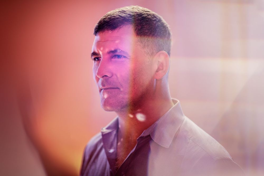 Dramatic portrait with warm lighting and soft focus effects.