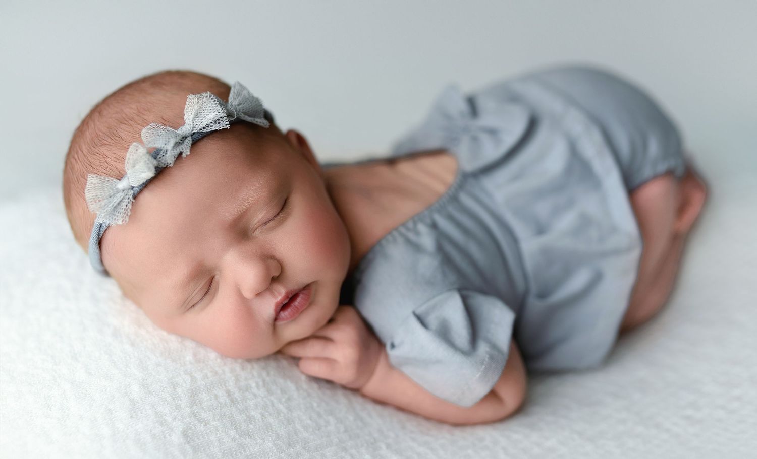 An up-close shot of the bum up pose of newborn baby girl.  - Greenville SC newborn photographer - Easley SC newborn photographer