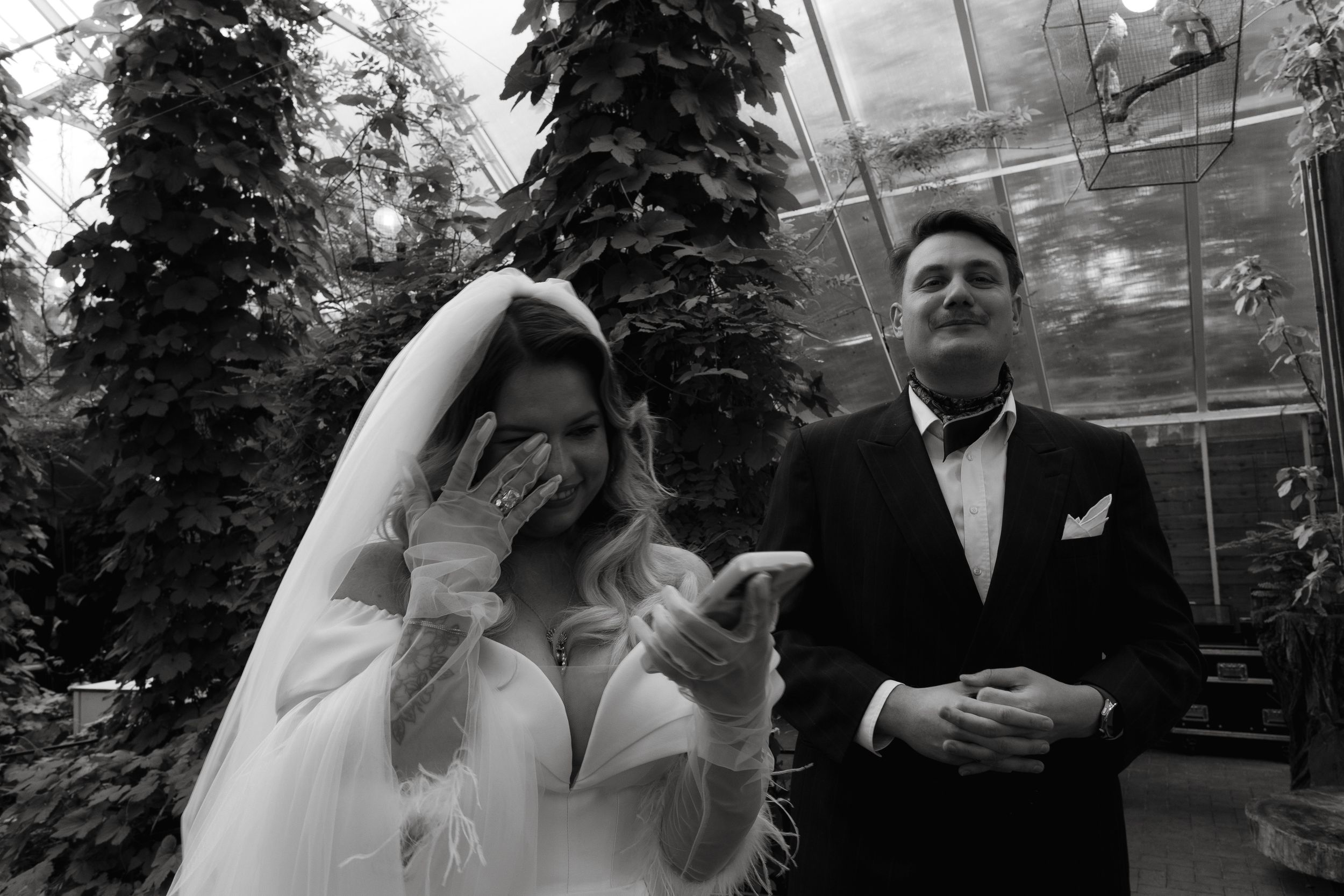 A black and white photo collage showing different moments from a wedding celebration with couples in formal attire.